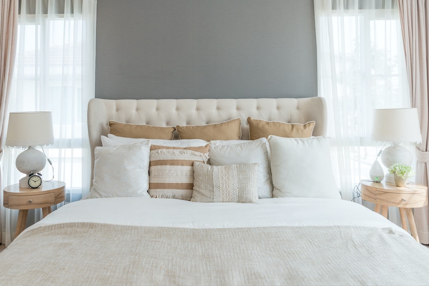 bed with decorative pillows